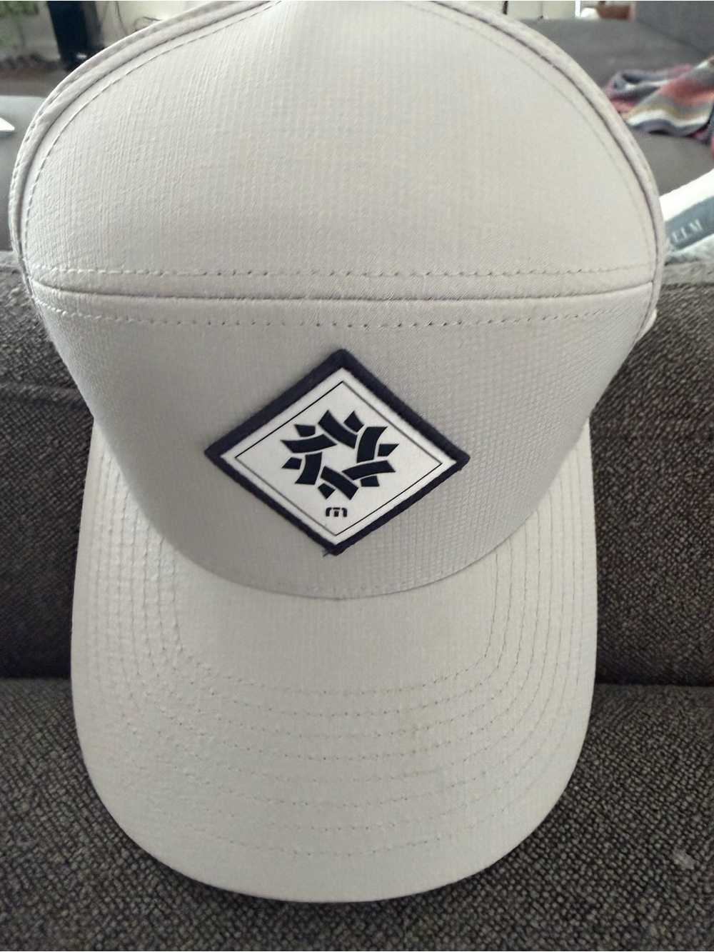 The Ledges Golf Course in St. George, UT. Men's White Logo Baseball Cap
